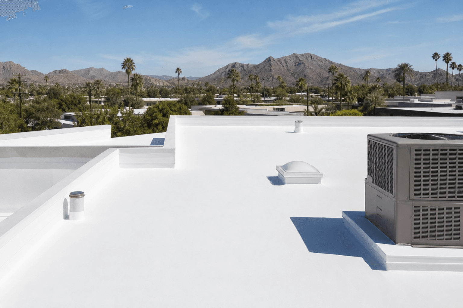 Clean white foam roof section with flashed penetrations